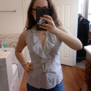 Sleeveless button down top
